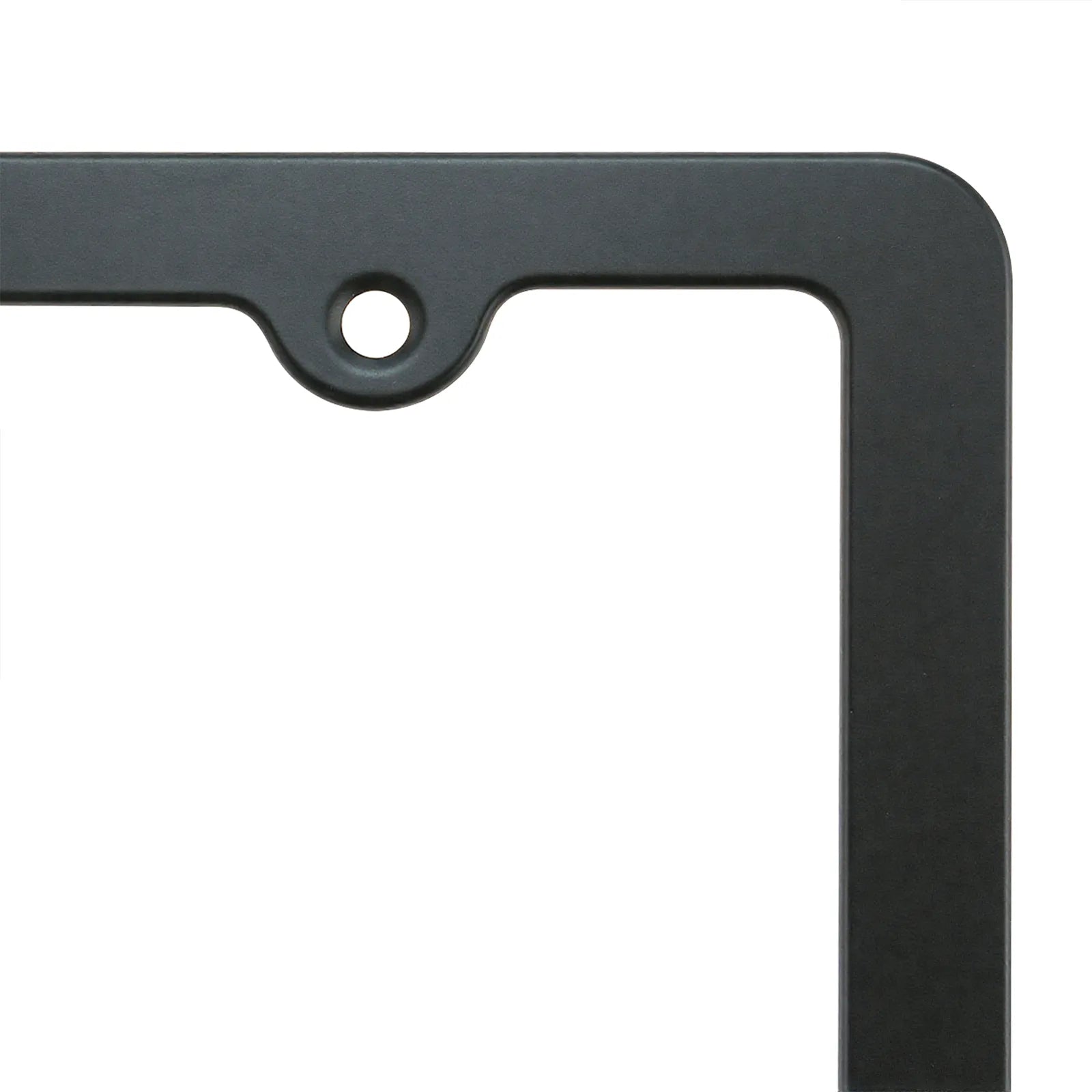 Detailed view of the top mounting hole on the Cleanstroke customizable matte black aluminum license plate frame, highlighting the precision cut designed for secure 4-hole installation and a perfectly smooth powder-coated surface.